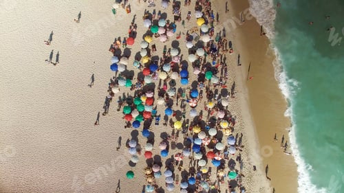 Preview: People Relaxing On The Ipanema Beach In Rio De Janeiro, Brazil. Top View With Ocean