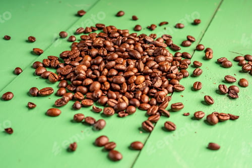 Preview: Roasted Coffee Beans, Green Background, Natural Lens Blur With Small Depth Of Field
