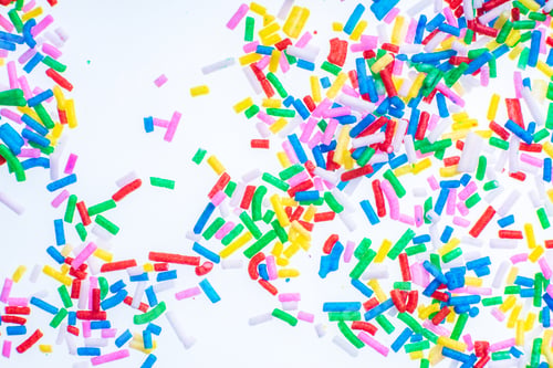 Preview: Colorful Candy Sprinkles Close Up For Birthday Cake On White Background