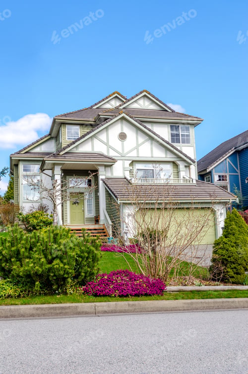 Preview: Luxury House With Beautiful Landscaping On A Sunny Day. Home Exterior Design.
