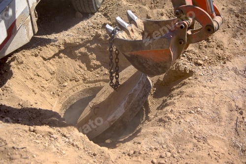 Preview: The Concrete Lid Of A Septic Tank Being Popped Open In Preparation Of Having The Waste Inside