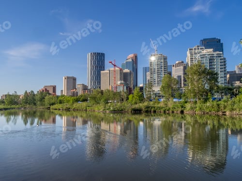 Preview: Calgary Skyline With Bow River In Foreground.