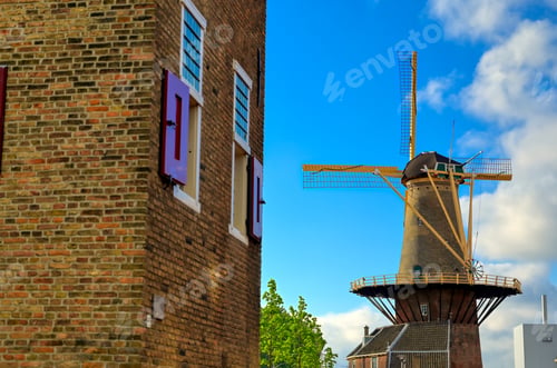 Preview: A Windmill In The City Of Delft In The Netherlands On A Sunny Day.