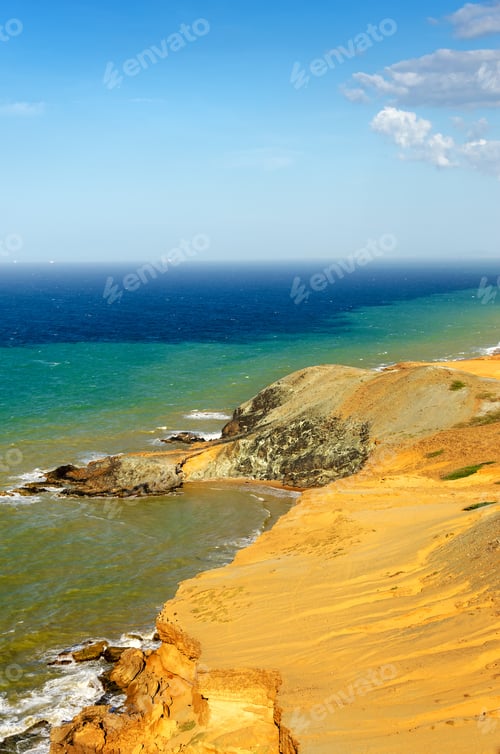 Preview: View Of A Dry Desert Coastline And The Caribbean Sea With Various Shades Of Blue Near Cabo De La