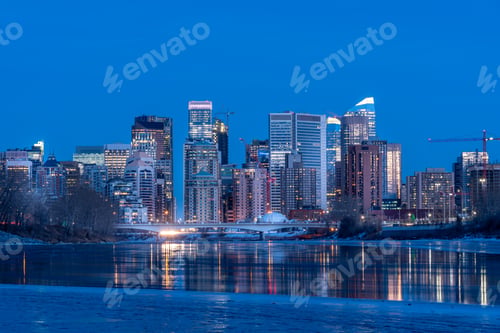 Preview: Calgary'S Skyline Along The Bow River During The Winter.