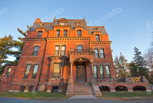 Preview: A Brick Victorian Church Parish Building In The Glow Of Morning Sunlight