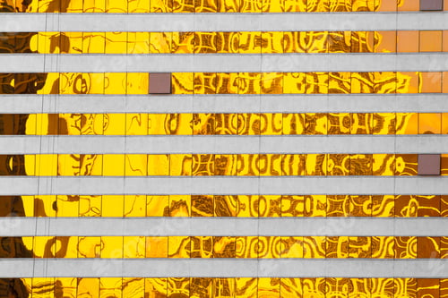 Preview: Abstract Created By Golden Yellow Reflections On Modern Building Windows