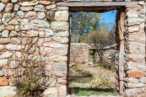 Preview: Overgrown Courtyard Surrounded By Stone Walls In Rural Bolivia