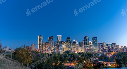 Preview: Calgary'S Skyline At Night Along The Bow River Valley.