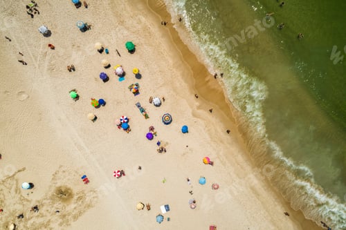 Preview: People On The Beach. Top Aerial View With Ocean And Colorful Umbrellas