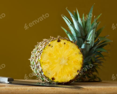 Preview: Ripe Hawaiian Pineapple On A Cutting Board With Knife