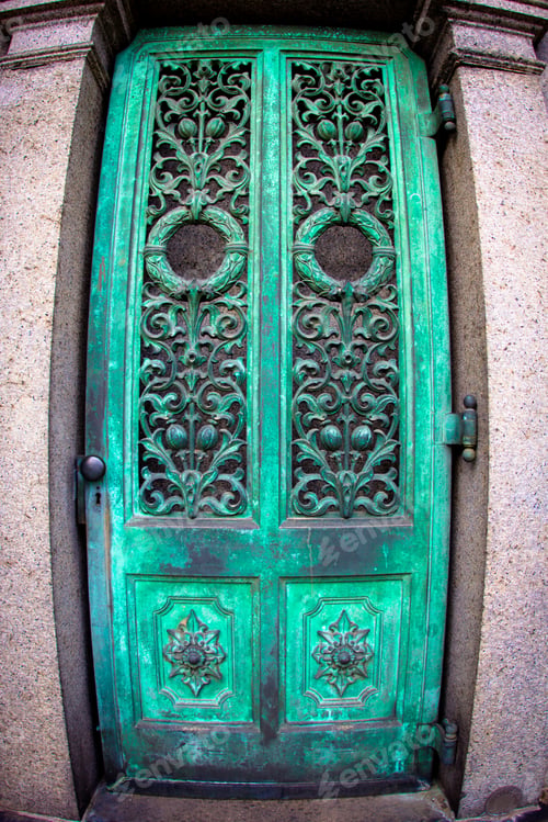 Preview: Fisheye Of Detailed, Ornate Copper Door With Patina
