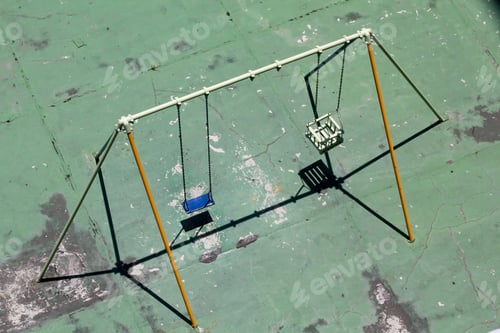 Preview: Old And Abandoned Playground With Swin