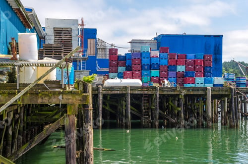 Preview: View Of A Dock And Fish Processing Plant In Newport, Oregon