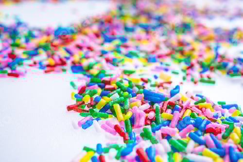 Preview: Colorful Candy Sprinkles Close Up For Birthday Cake On White Background