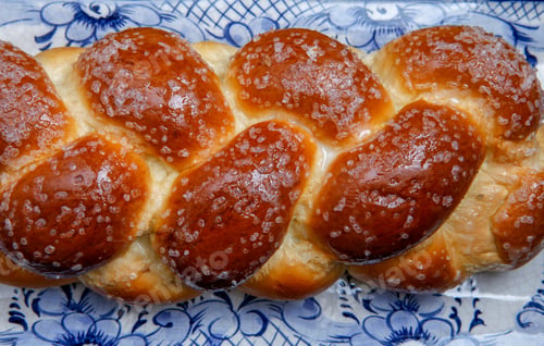 Preview: Sweet Twist Bread, Typical Of Brazilian Bakery, On Dish Decorated In Blue In Rustic Wooden Table
