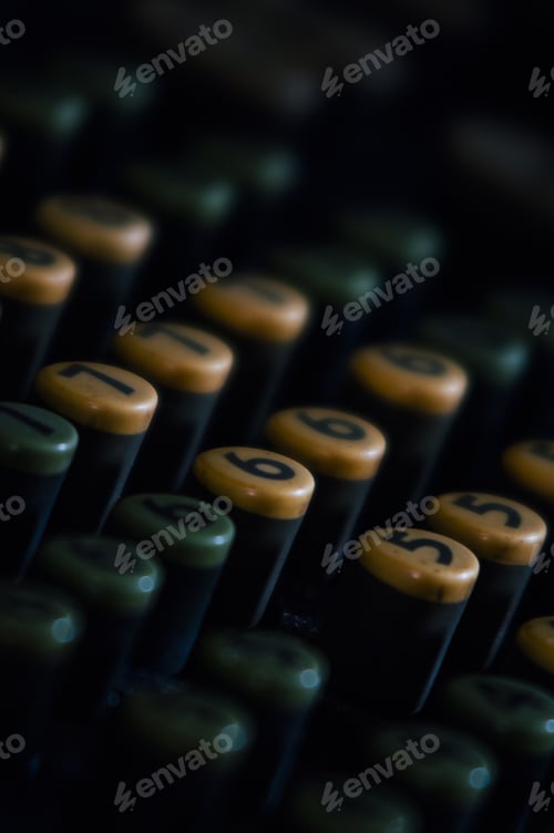 Preview: A Macro / Micro View Green And White Numbered Buttons On An Antique Adding Machine At An Abandoned