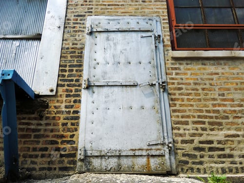 Preview: Industrial Steel Door Photo On Brick Wall