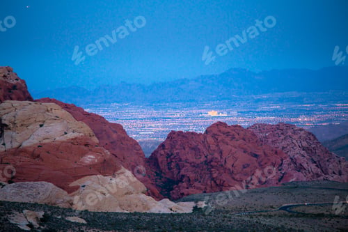 Preview: Red Rock Canyon In Nevada At Dusk With The Light Of Las Vegas Seen Below
