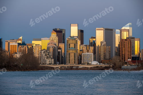 Preview: View Of Calgary'S Skyline Along The Bow River At Dusk.