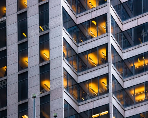 Preview: Urban Office Building With Illuminated Lights In Windows