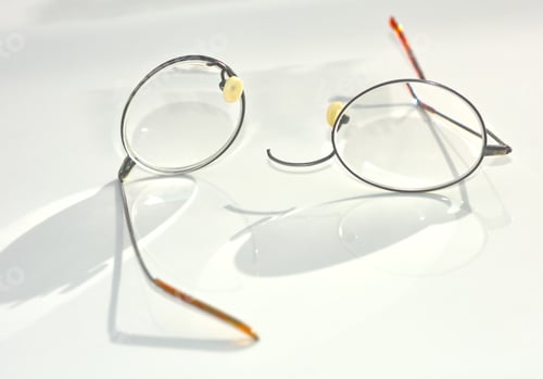 Preview: A Pair Of Titanium Wire Rim Eye Glasses That Have Broken And Split Apart On The Nose Bridge Section.