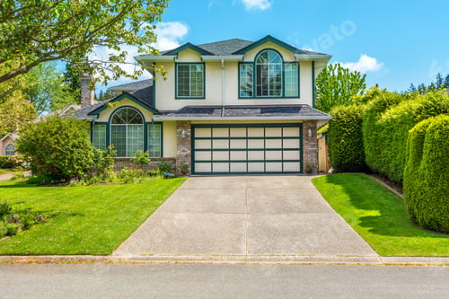 Preview: Luxury House With Beautiful Landscaping On A Sunny Day. Home Exterior.