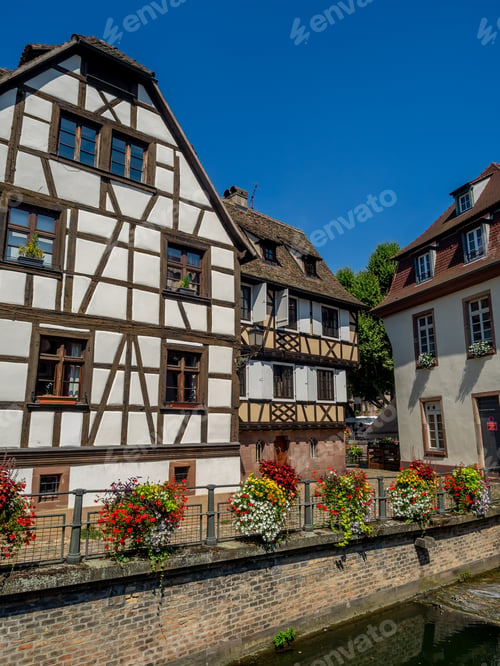 Preview: Along The Ill River In Petite France Areas Of Strasbourg In The Alsace Region Of France. The Homes