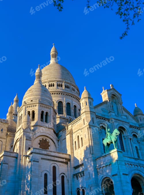 Preview: The Basilica Of The Sacred Heart Of Paris, Located In The Montmartre District Of Paris, France.