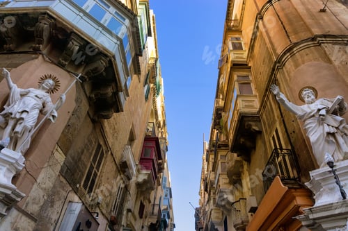 Preview: Sculptures Are Erected On The Corner Of A Street In Valletta, Malta