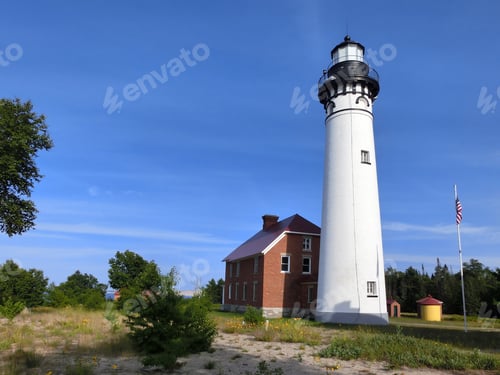 Preview: Scenic Northern Michigan White Lighthouse In Summer Evening Sunlight