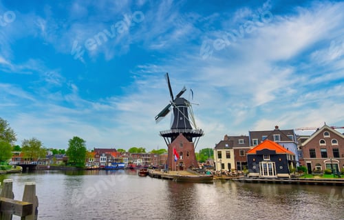 Preview: A Windmill Along The Canals In Haarlem, Netherlands On A Clear Day.