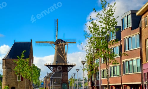 Preview: A Windmill In The City Of Delft In The Netherlands On A Sunny Day.