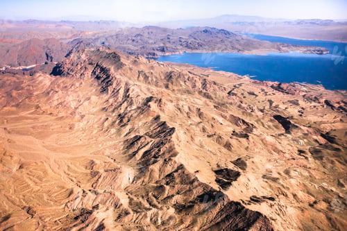 Preview: Aerial Photography Of Landforms Over Nevada With Mountains And Lake Mead In View