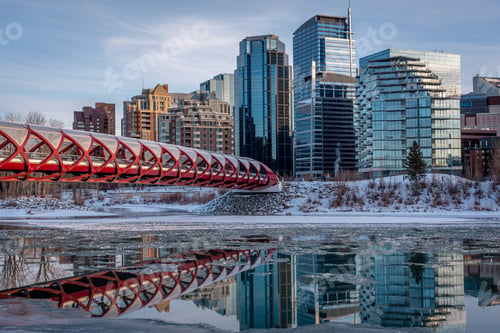 Preview: Evening Skyline View Along The Bow River In Calgary, Alberta. Peace Bridge Visible.