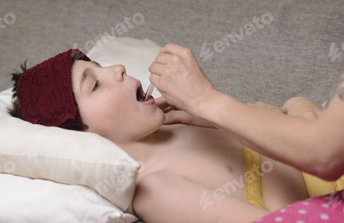 Child Receives Medication Lying on a Pillow