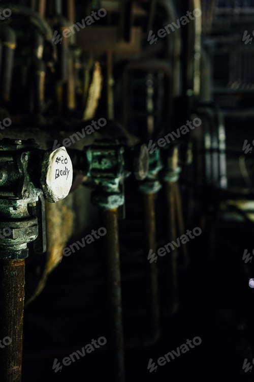Preview: A View Of Rusty, Derelict Vertical Steel Pipes At A Abandoned And Now Demolished Steel Mill.