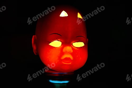 Preview: A Lamp In The Shape Of The Devil Decorating A Halloween Party On A Black Background.