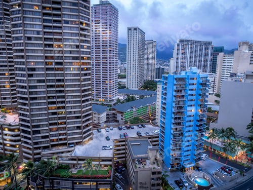 Preview: Waikiki Skyline In The Evening With Clouds Rolling In Over The Mountains.