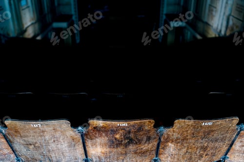 Preview: A Detail View Of Wood And Cast Iron Seats At An Abandoned And Historic Theater In The South Side