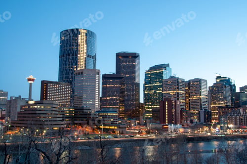 Preview: Calgary Skyline At Dusk, With Bow River In Foreground.