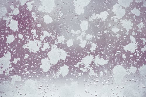 Preview: Toned Winter Window With Snow And Water Droplets