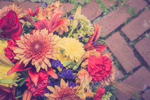 Preview: Vintage Filter Effect Of Bouquet Of Autumn Flowers Against Brick Background