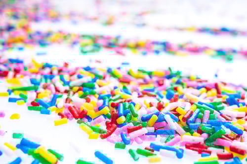 Preview: Colorful Candy Sprinkles Close Up For Birthday Cake On White Background