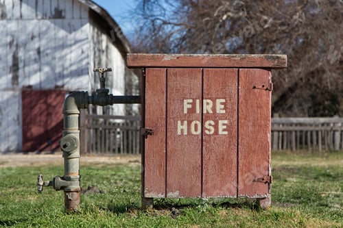 Preview: Old Fashioned Fire Hose Box On Rural Farm In The United States