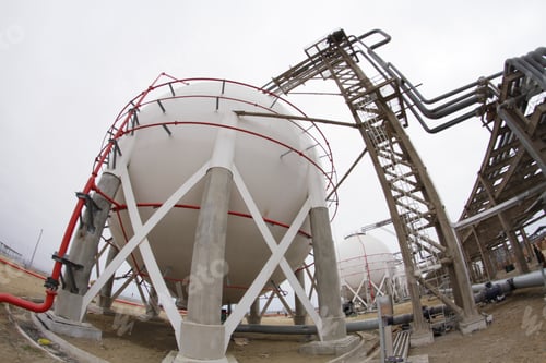 Preview: Fuel And Gas Storage Tank On Cloudy Day