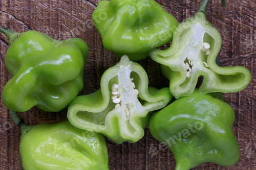 Preview: Close Of Green Pepper Cambuci On Wooden Background