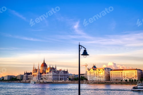 Preview: The Hungarian Parliament Building Located On The Danube River In Budapest Hungary At Sunset.