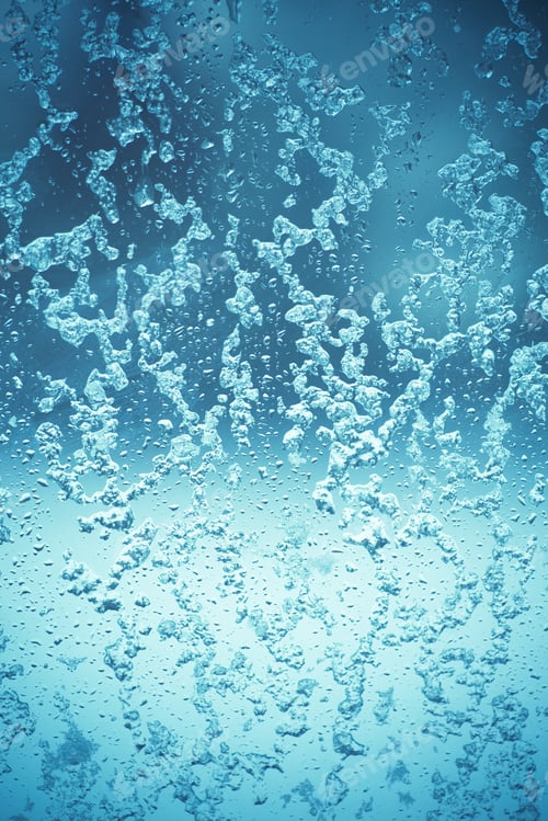 Preview: Toned Winter Window With Snow And Water Droplets