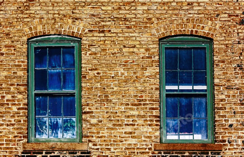 Preview: Two Blue Windows On An Old Brick Wall